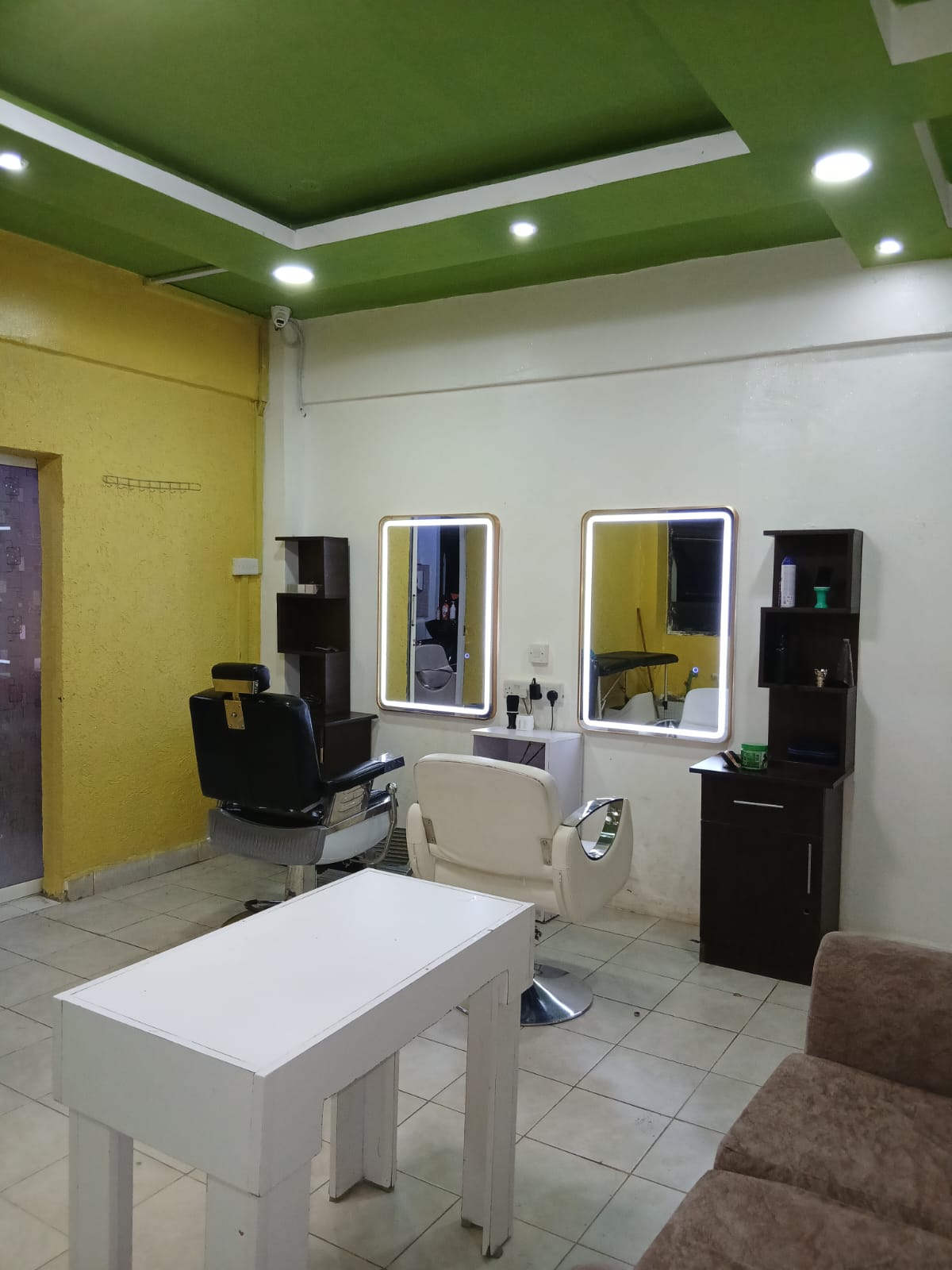 Interior of Sarma Hair and Beauty Spa, dark luxury suite with rose gold lighting
