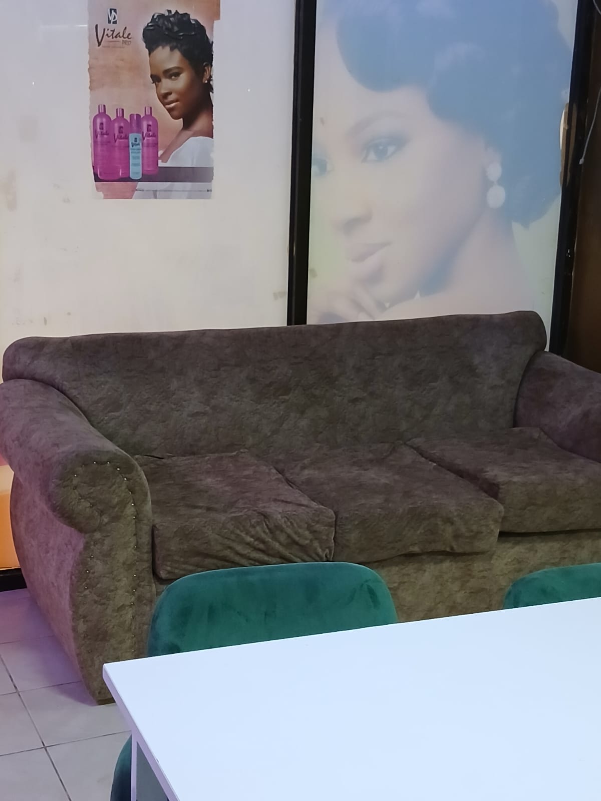 Reception sofa with beauty wall poster